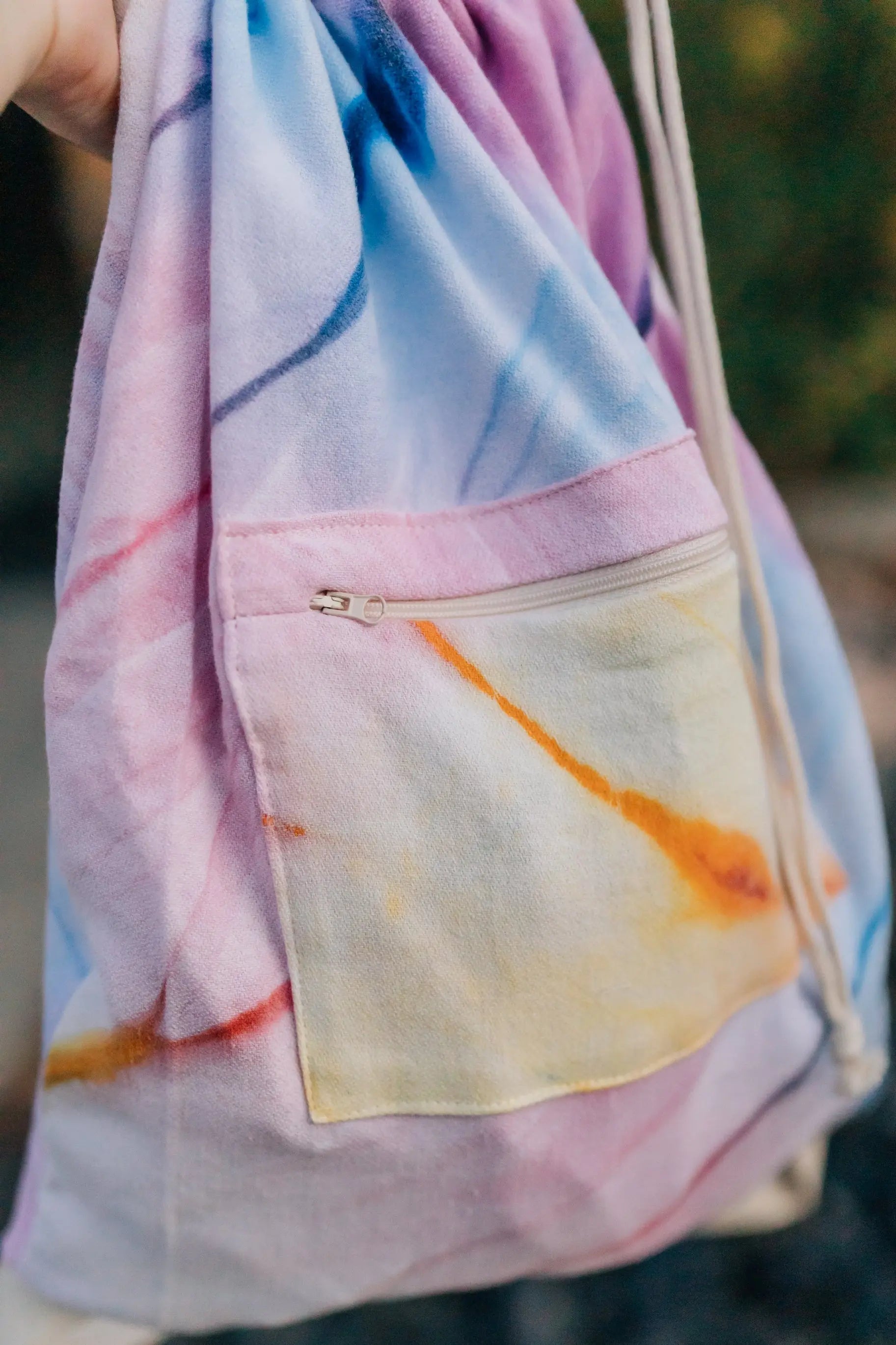 beach backpack with zipper pocket - tie dye purple blue orange yellow. drawstring convertible towel 