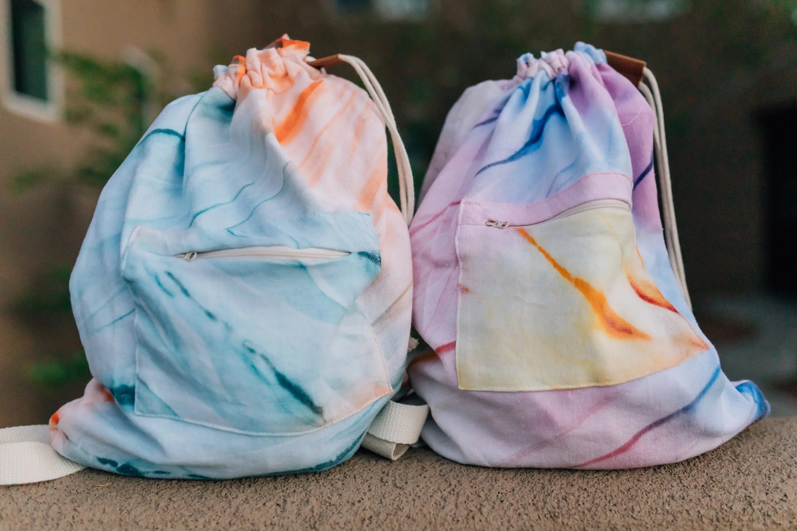 zipper pocket, drawstring beach backpacks- light weight and sand free - tie dye with shoulder straps - convertible towel 