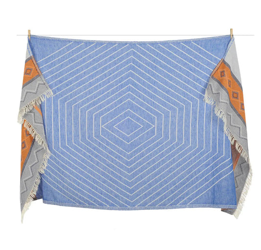 blue orange sand free turkish towel with tassels . reversible pattern , soft 
