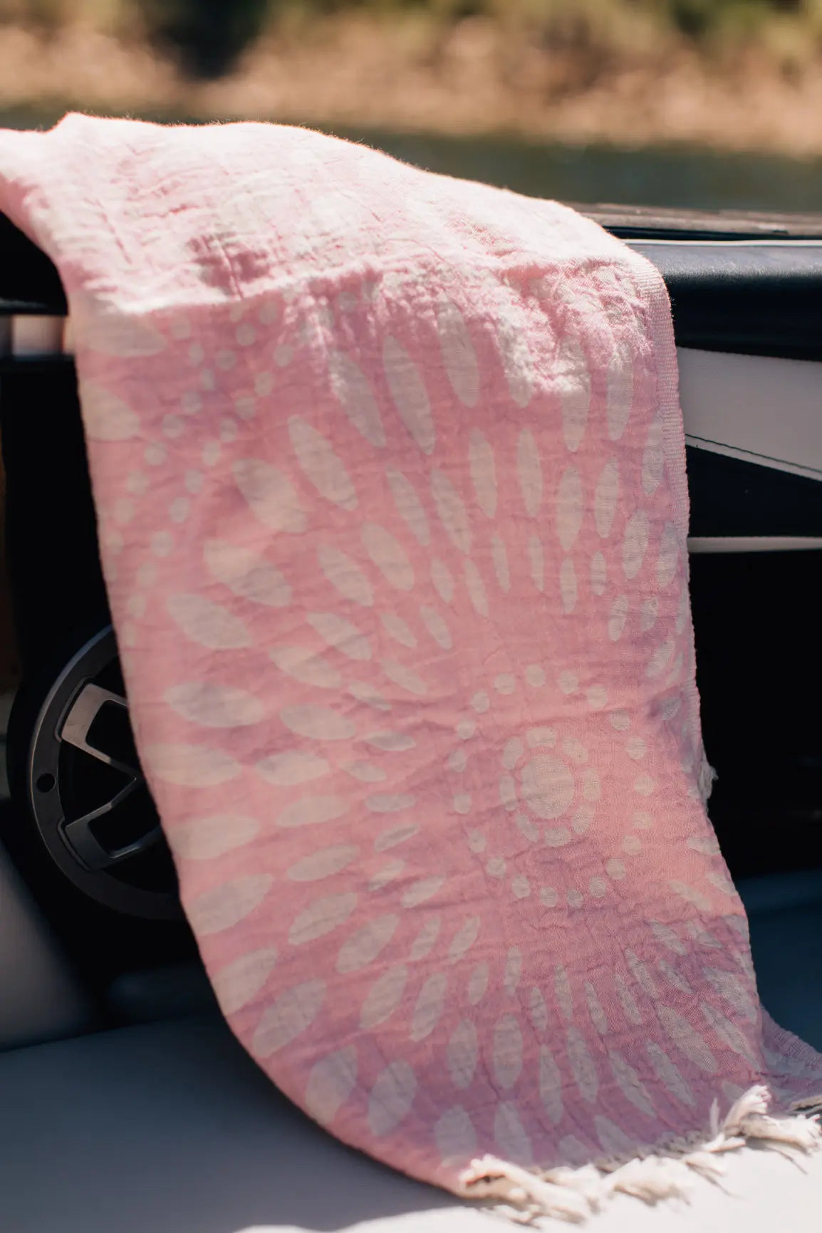 Pink beach boating towel on surf boat compact towel with flower pattern. turkish towel 