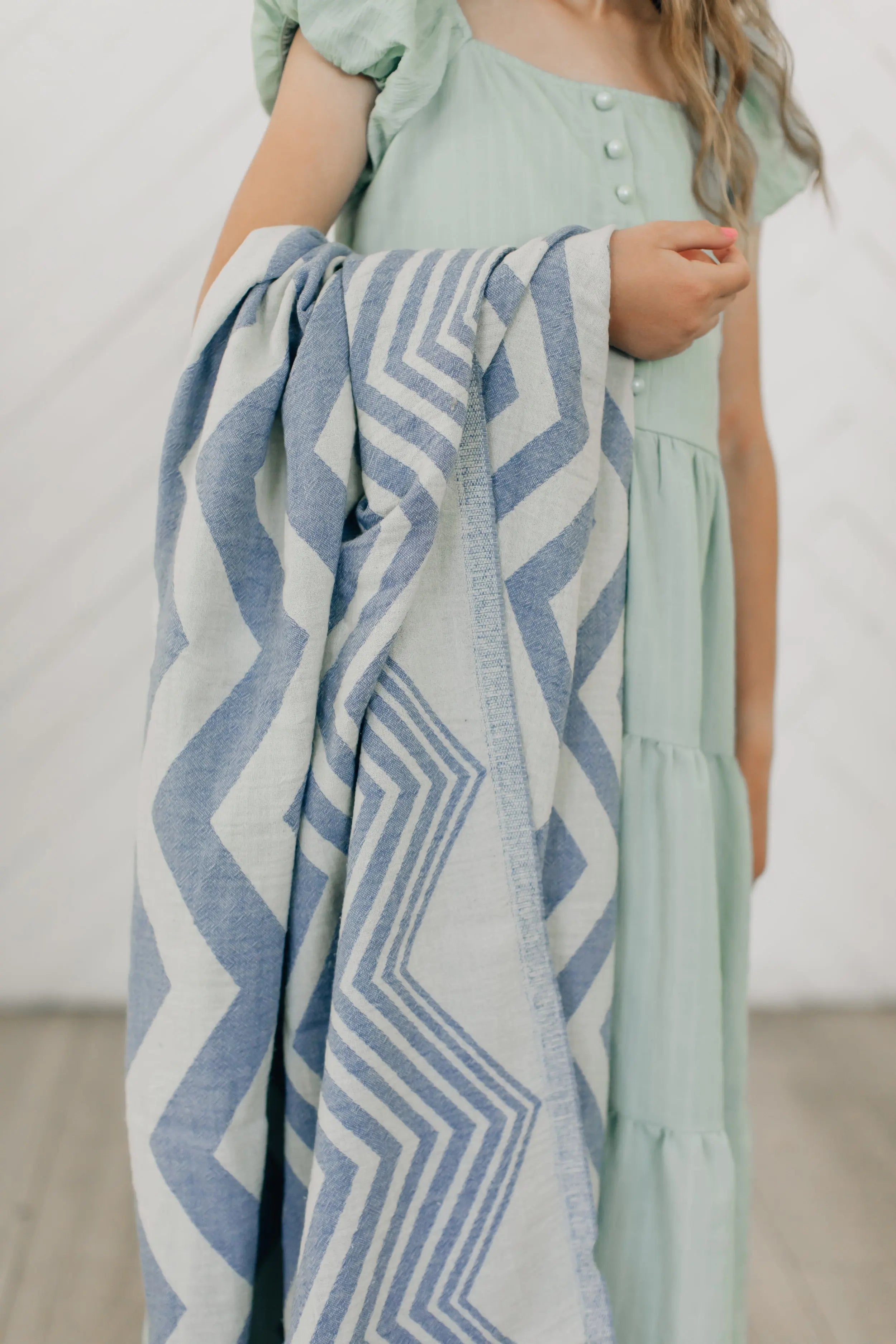 denim blue - chambray- zig zag - chevron - sand free turkish towel with young girl in easter dress 