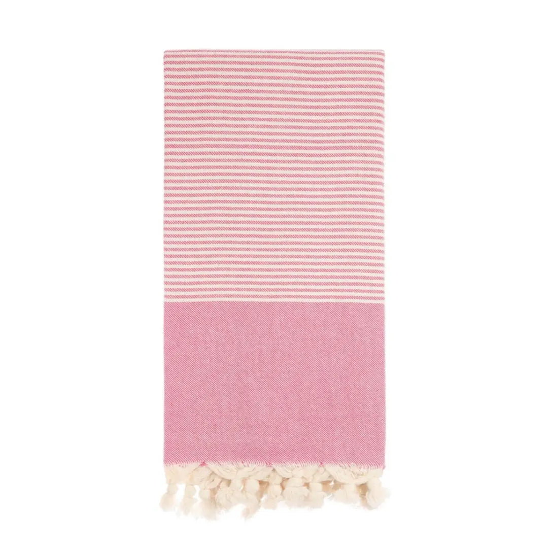 pink vintage traditional turkish towel with stripes and tassels