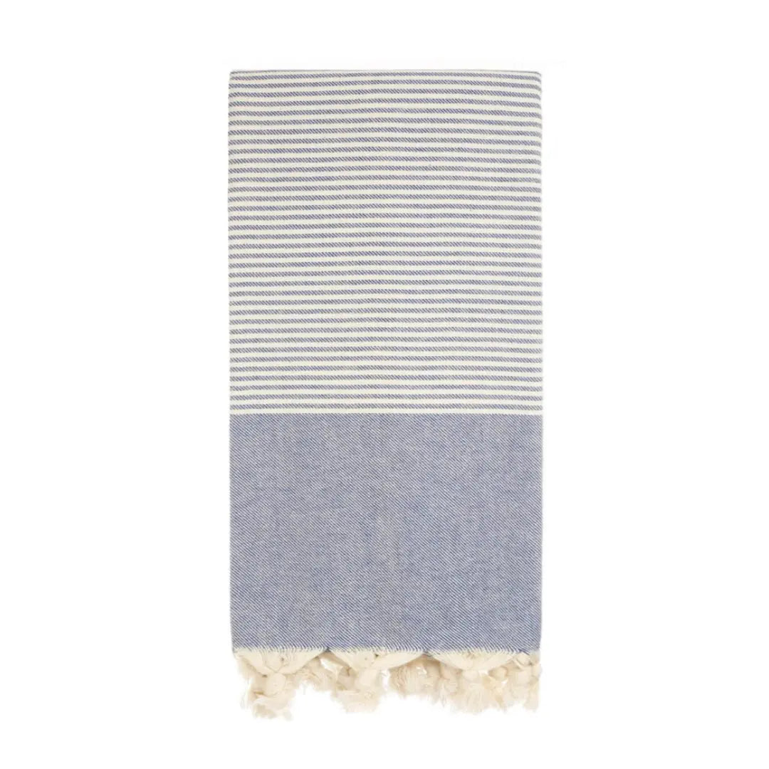 light blue soft turkish towel with stripes and hand tied tassels